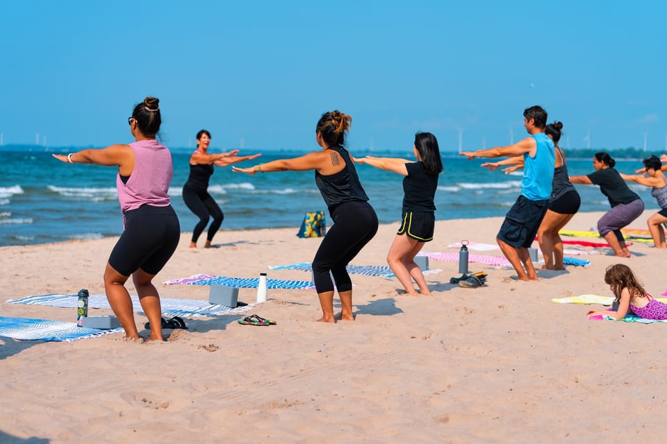 Morning yoga on the beach at The Long Beach Resort